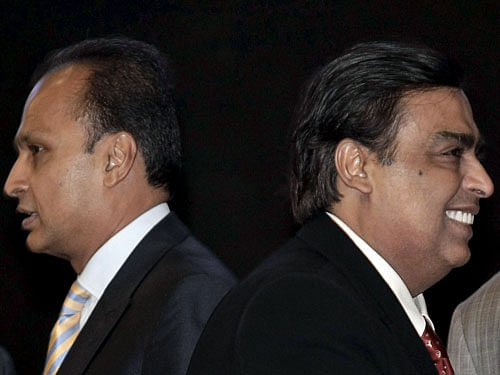 File photo of Mukesh Ambani, chairman of Reliance Industries, and his brother Anil Ambani, chairman of Reliance Group. Reuters