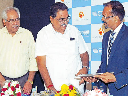 Principal Chief Conservator of Forests Vinay Luthra, Forest, Ecology and Environment Department Minister B Ramanath Rai and Forest, Ecology and Environment Department Additional Chief Secretary Mahendra Jain at the release of the scientific journal in Bengaluru on Wednesday. dh Photo