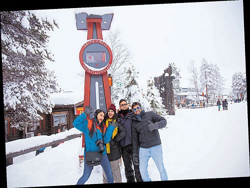 FUN UNLIMITED: The author (extreme left) at the Arctic Circle, with friends.