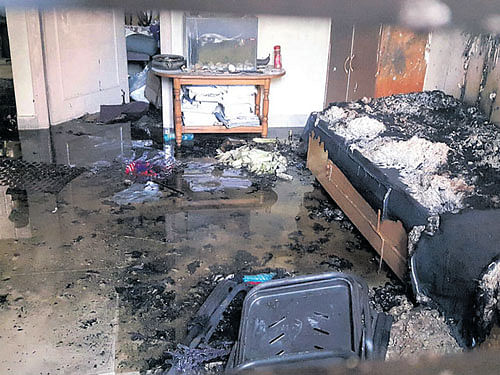 The house which Deepak set on fire in Srirampuram  police limits past midnight on Friday. DH photo