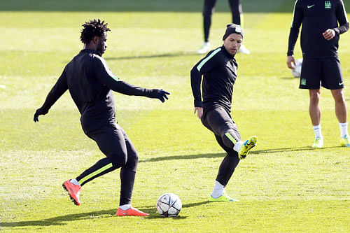 Take that: City's Sergio Aguero and Wilfried Bony during training Action. Reuters / Carl Recine Livepic