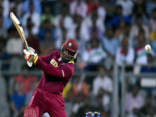 Chris Gayle in action during a ICC WT20 match against England at Wankhede Stadium in Mumbai. PTI photo