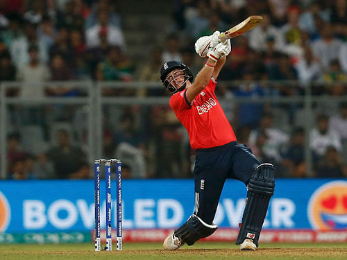 England's Joe Root plays a shot. Reuters Photo.