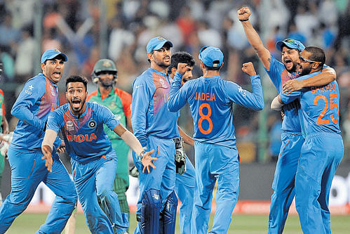 over the moon: Indian players celebrate after scripting an incredible win over Bangladesh in Bengaluru on Wednesday. dh photo/ RANJU P