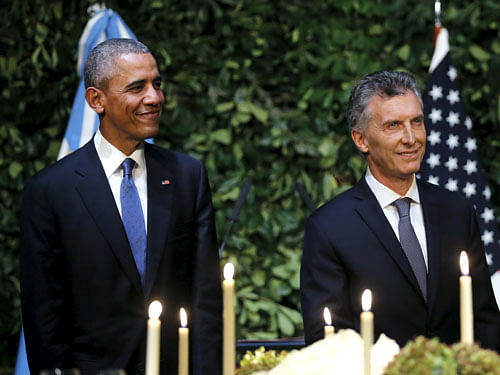 U.S. President Obama and Argentina's President Macri arrive at a state dinner in the Centro Cultural Kirchner as part of President Obama's two-day visit to Argentina, in Buenos Aires. Reuters Photo.