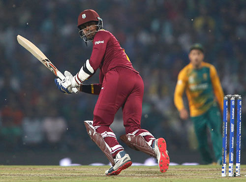South Africa v West Indies - World Twenty20 cricket tournament - Nagpur, India, 25/03/2016. West Indies Marlon Samuels watches the ball after playing a shot. REUTERS