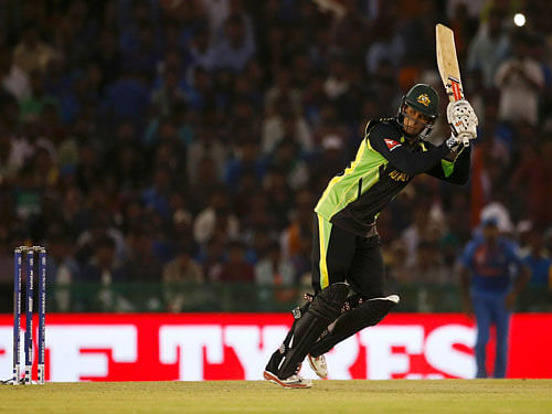 India v Australia - World Twenty20 cricket tournament - Mohali, India - 27/03/2016. Australia's Usman Khawaja plays a shot. REUTERS Photo