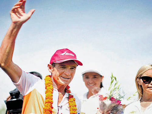 Pat Farmer celebrates the conclusion of his marathon  in Srinagar on Tuesday. PTI