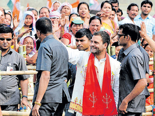 reaching out: Congress vice-president Rahul Gandhi at an election rally in Diphu in  Assam on Tuesday . AFP