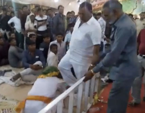 Controversial BJP MP Vitthal Radadiya today admitted to kicking an elderly man during a music event. Screengrab