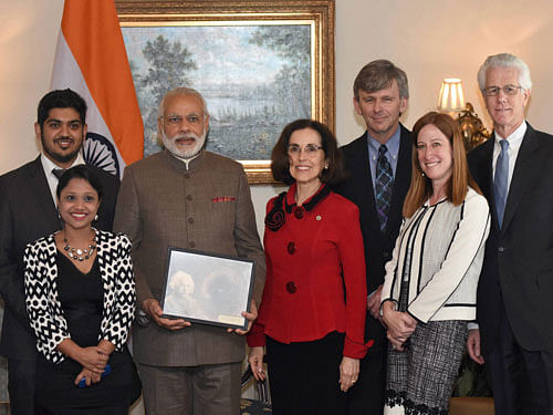 Prime Minister Narendra Modi poses with a group of Scientists including some of Indian origin from Laser Interferometer Gravitational Wave Observatory (LIGO) after their bilateral meeting in Washington on Thursday. PTI Photo
