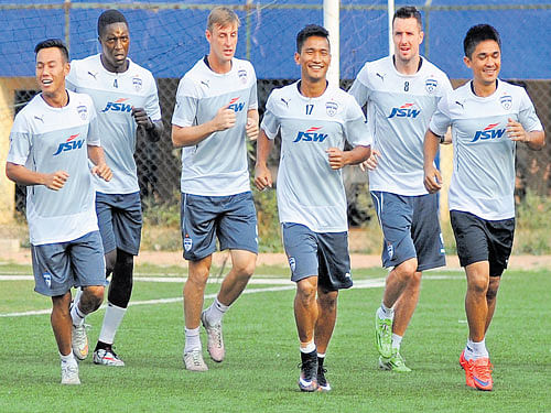 happy bunch: Bengaluru FC players during a training session on the eve of their I-League tie. dh photo/ kishor kumar bolar