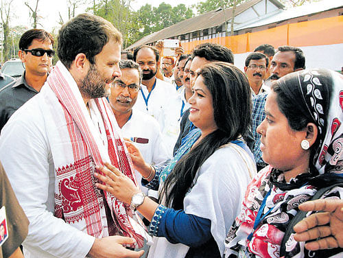 Congress vice-president Rahul Gandhi being welcomed by party workers during an election rally at Gandhi Maidan in Abhayapuri on Monday. PTI