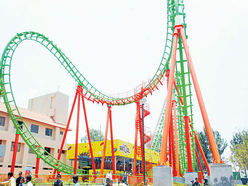 New attraction Recoil, a reverse looping roller coaster, was unveiled at Wonderla, Bidadi, on Monday. dh photo