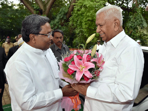 Chief Minister Siddaramaiah with Governor Vajubhai Vala. DH file photo