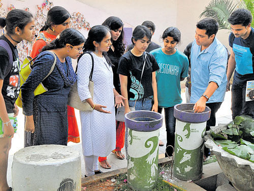 Students take part in a workshop on 'Dustbin design for MG Road' at the Rangoli Metro Art Center on Tuesday. DH PHOTO