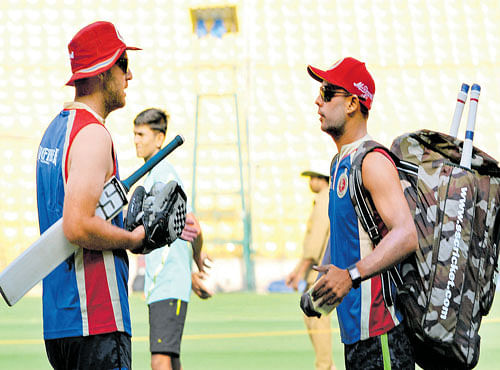 GEARED UP: Coach Daniel Vettori (left) feels the arrival of all-rounders like Stuart Binny (right) and ShaneWatson has bolstered the Royal Challengers Bangalore squad immensely. DH PHOTO