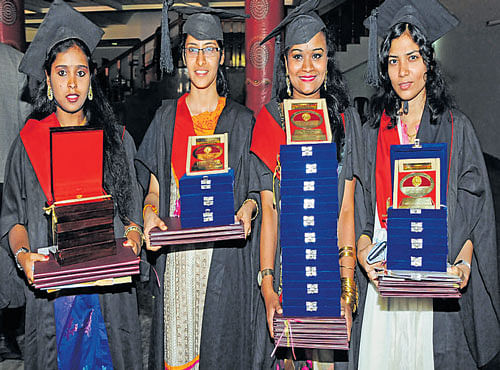 Goldmedal winners Dr VidyadriM(4medals), DrSamantha Honavar (3medals, 2 cash prizes), Dr NishaBJain (10medals) and Dr AishwaryaUmeshchandraG(5medals) at the 18th annual convocation of RGUHS in Bengaluru on Tuesday. DH PHOTO