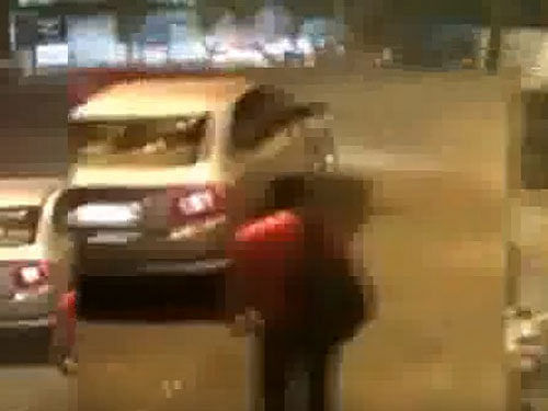 The nearly 1 minute 20 seconds-long clip of the Monday's incident, shared with the media by victim Siddhartha Sharma's relatives, shows him trying to cross a clear road near a traffic intersection and later running towards the pavement as he sees the approaching car. Screen grab.