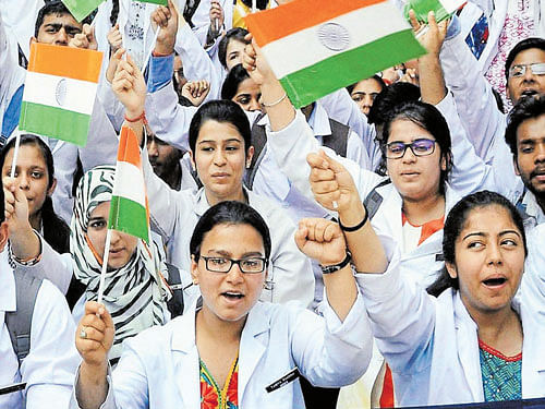 For Justice: Students of government medical college during a protest against police action on non-Kashmiri students in NIT Srinagar, in Jammu on Thursday. PTI