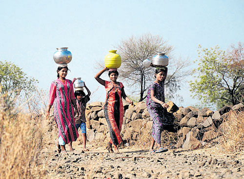 Fetching drinking water has become a herculean task in summer due to depleting resources. Residents of Chellagurki in Ballari district have to trudge 20 km for 3 potfuls by paying Rs 20.  A representative image.