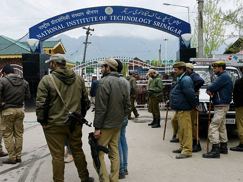 Police and CRPF deployed at National Institute of Technology (NIT) following tension between local and non-local students in Srinagar, PTI photo