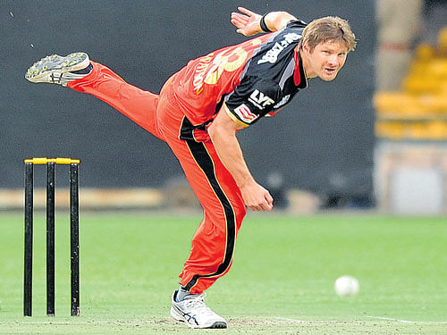 Focussed Royal Challengers Bangalore's all-rounder Shane Watson bowls during their  training session at the Chinnaswamy Stadium on Saturday. DH photo/Srikanta Sharma R