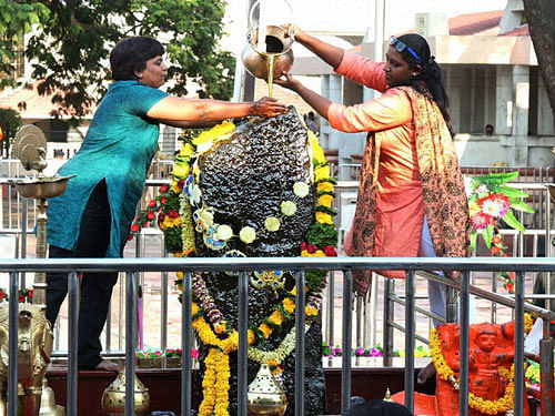 Women entered the sanctum sanctorum Shani Shingnapur temple and offer prayers breaking the tradition followed for several decades, in Ahmednagar, Maharashtra on Friday. PTI Photo
