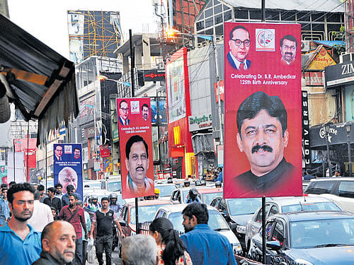 Ad boardswere put up on the Brigade Road to mark the 125th birth anniversary celebrations of Dr BR Ambedkar onWednesday. DH PHOTO