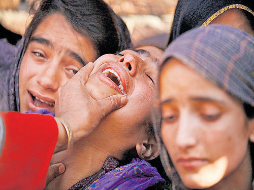 Relatives of Raja Begum,whowaswounded after Indian security forces fired on protesters on Tuesday, mourn during her funeral in Langate, Srinagar, on Wednesday. Begum succumbed to her injuries on Wednesday. REUTERS