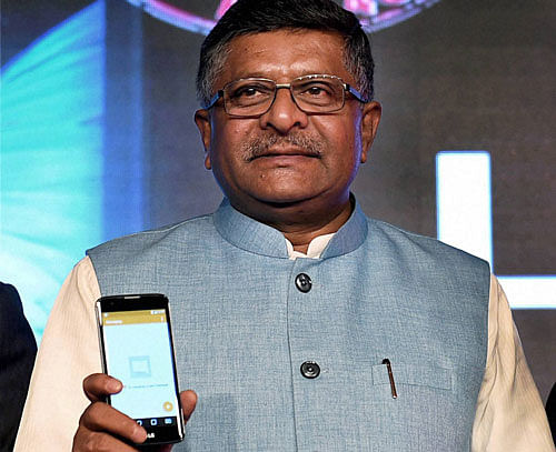 Union Minister of Communications & Information Technology Ravi Shankar Prasad launches LG's first made in India mobile phones K7 & K10, during a function in New Delhi on Thursday. PTI Photo