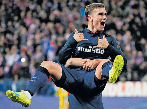 no stopping him: Atletico Madrid's Antoine Griezmann celebrates scoring against Barcelona on Wednesday. Reuters