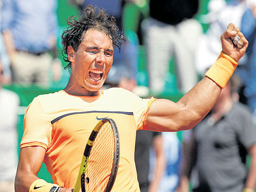much-needed victory: Rafael Nadal celebrates his win over Stanislas Wawrinka. reuters