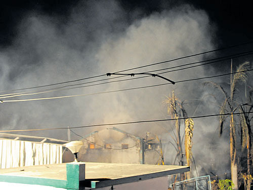 Flames break out in an industrial unit in Kumbalgodu, offMysuru Road, on Friday. DH PHOTO