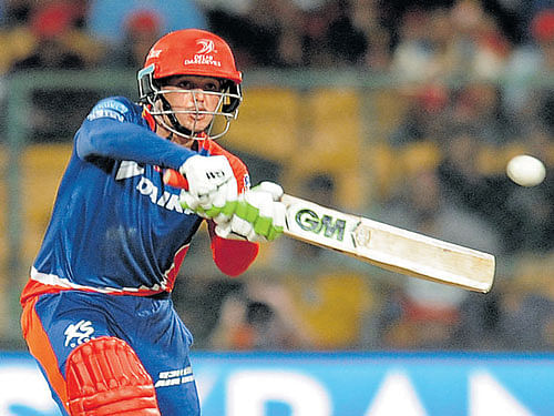 Delhi Daredevils' Quinton de Kock en route his 51-ball 108 against Royal Challengers Bangalore in Bengaluru on Sunday. De Kock's ton, which was also the first of the tournament, set up Delhi's seven-wicket win.  DH Photo/ Srikanta SHARMA R