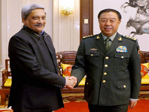 Defence Minister Manohar Parrikar being welcomed by Gen. Fan Changlong, Vice Chairman of the China's Central Military Commission in Beijing on Monday. PTI Photo