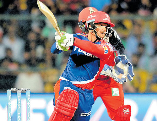 ON SONG: Quinton de Kock's blistering onslaught was too much to handle for RCB on Sunday. DH photo/ SRIKANTA SHARMA R