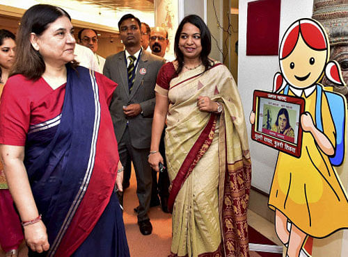 Maneka Sanjay Gandhi, Minister for Women & Child Development, watches an exhibition before Launching Beti Bachao, Beti Padhao Scheme in Additional 61 Districts, in New Delhi on Tuesday. PTI Photo