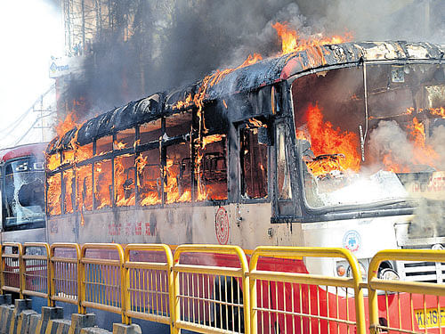 bus set on fire by protesting garment workers.