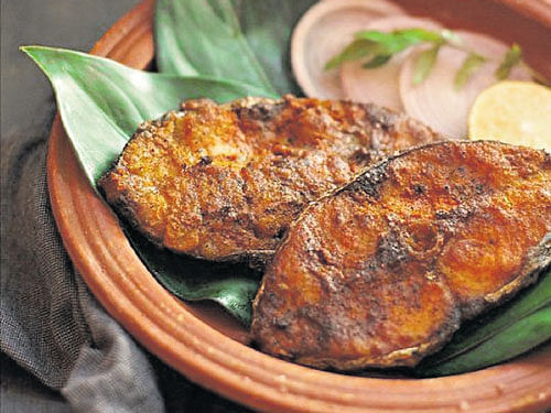 Delicious Seer fish tawa fry, (Below left) 'dal makhani' and (right) mutton 'rogan josh'.