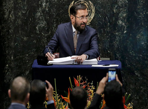 Indian Union Minister of State for Environment, Forests and Climate Change Prakash Javadekar signs the Paris Agreement on climate change at the United Nations Headquarters in New York. Reuters photo