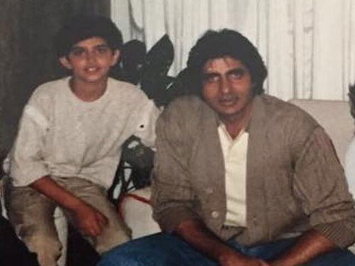 Hrithik Roshan shared a photo of his child self, where he is sitting beside megastar Amitabh Bachchan and happily posing for the camera. Courtesy: @iHrithik