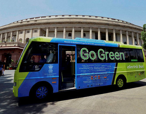 An electric bus which ferries lawmakers to Lok Sabha, at Parliament House on the first day of the second part of budget session in New Delhi on Monday. PTI Photo