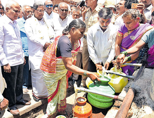 Chief Minister Siddaramaiah visits a village in Belagavi district on Monday to take stock of the situation during the second phase of his tour to the drought-hit areas. DH&#8200;Photo