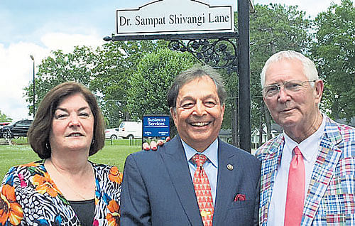 Dr Sampath Shivangi (centre) at the lane named after him in Mississippi, United States.