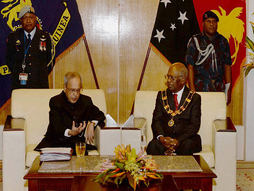 President Pranab Mukherjee with Grand Chief Sir Michael Ogio, GCL, GCMG, KSt. J., Governor General of Papua New Guinea at Government House in Port Moresby in Papua New Guinea on Thursday. PTI Photo.