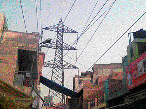 Around 10,000 households in 40 unauthorised colonies live under the state power  transmission lines. DH