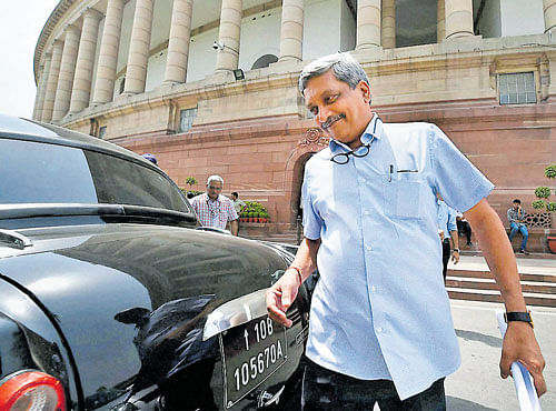 In for A long day: Defence Minister Manohar Parrikar during Parliament session in New Delhi on Wednesday. PTI