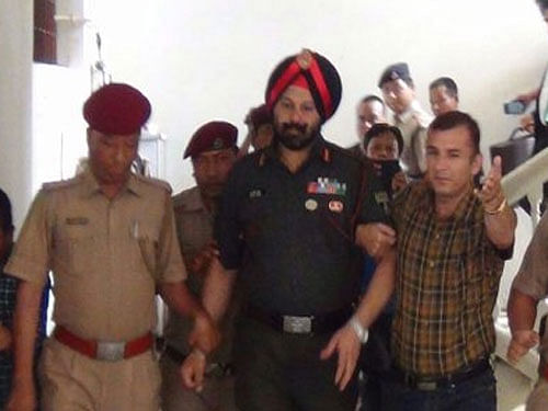 The police alleged that Singh ordered his men, armed with sophisticated weapons, to waylay a consignment of smuggled gold biscuits in the southern outskirts of Aizawl city on the night of December 14 last year. Image courtesy Twitter.