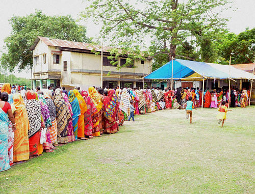 Long wait for rights: Citizens of Mashaldanga and nearby enclaves arrive to cast their ballots at a polling station in Cooch Behar district on Thursday during the final phase of the Assembly elections in West Bengal. PTI